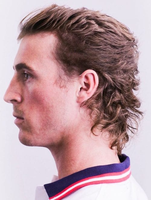 40 Modern Mullet Hairstyles For Men Pushed Back Top With Curled Mullet