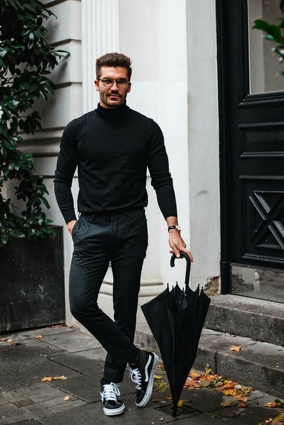 Black Turtleneck, Grey Pants, Black Sneakers And Glasses In A Minimalist Look