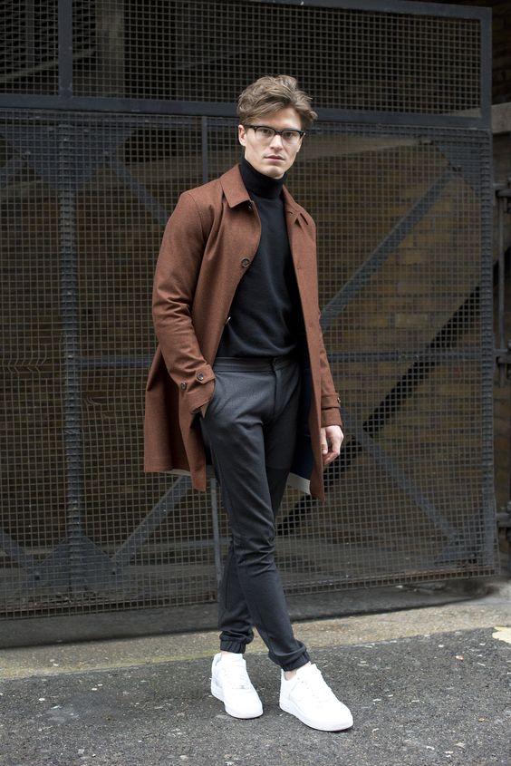 Minimalist Outfit With Black Turtleneck, Grey Jogging Shoes, Rust Coat And White Sneakers