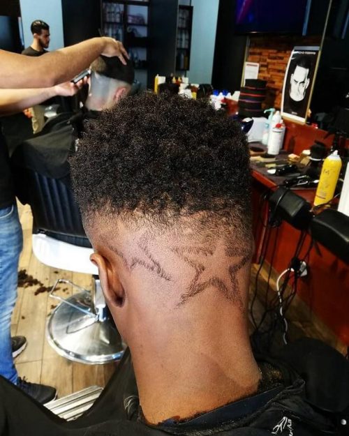 30 Cool Haircuts With Stars Design Unique Star Designs Haircut For Men Afro Curly Hairstyle With Star Design