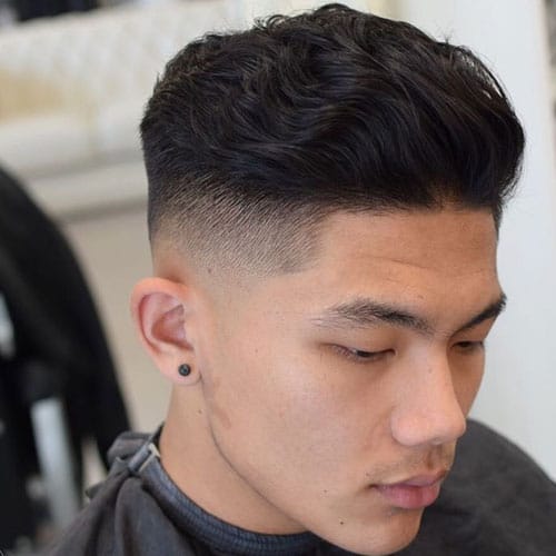 Top 30 Wavy Hairstyles For Men Best Men's Wavy Hairstyles 2020 Wavy Brushed Back Hair Low Skin Fade