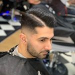 35 Popular Mens Short Back Sides Hairuts Tapered Short Back And Sides Hairsytle Low Skin Fade With Side Part Haircut 150x150 
