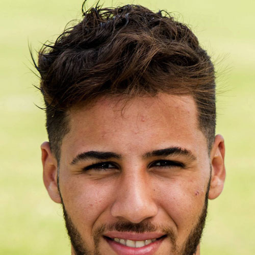 40+ Best Football Players Haircuts Soccer Hairstyles For Guys Saphir Taider + Tousled Wavy Hair + Low Fade + Beard