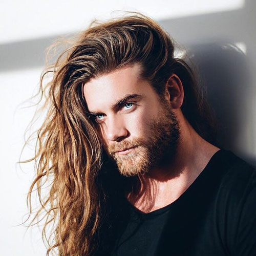 30 Best Surfer Hairstyles For Guys Beach Men’s Haircuts Men's Surfer Hairstyles 2020 Side Swept Long Surfer Hairstyle + Beard