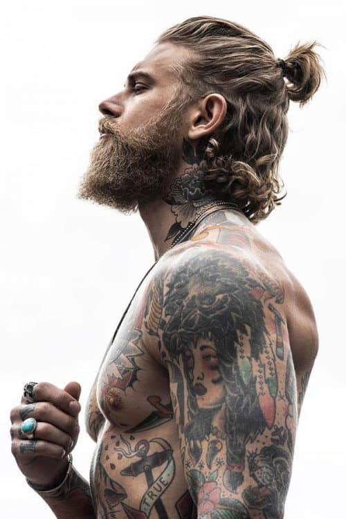 Top Knot Curly Surfer Hair With Beard