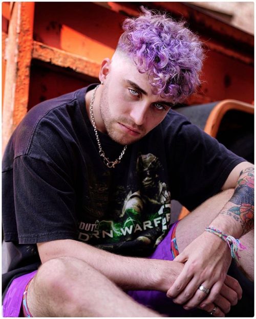 Men's Purple Curly Hairstyle With Skin Fade 40 Best Hair Dyes For Men Mens Hair Color Trends 2021 Colorful Hairstyle Ideas For Men
