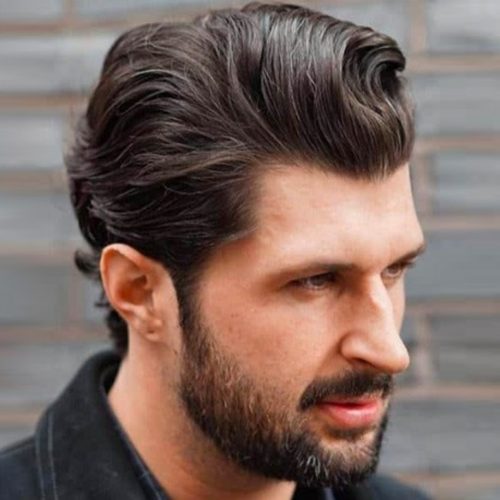Slicked Back Wavy Men's Hairstyle