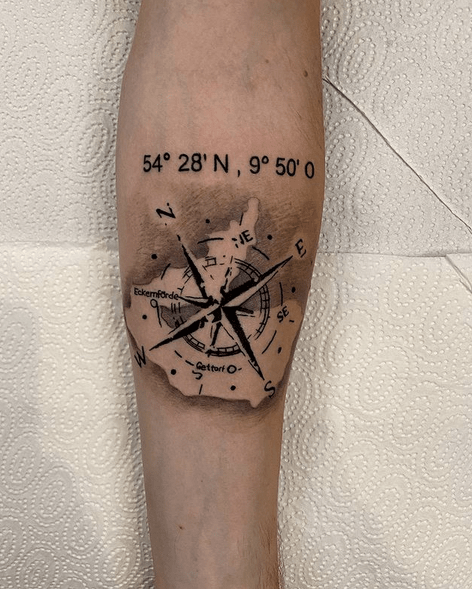 Compass Arm Tattoo With World Map 10