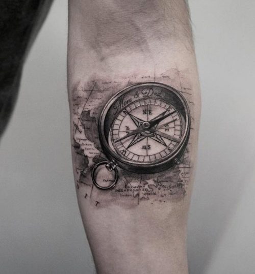Black And Grey Small Tattoo With Compass And Map On Forearm 113