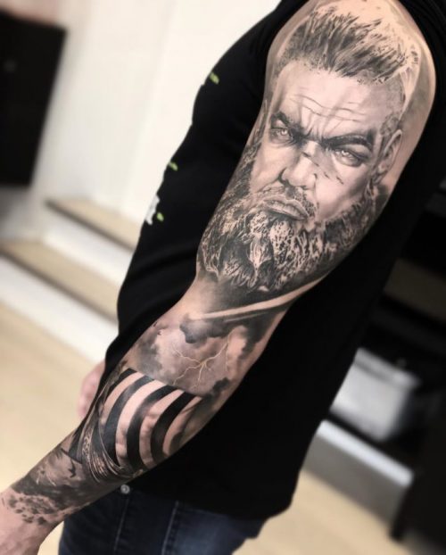 Viking Face Tattoo + Boat On Arm Sleeve