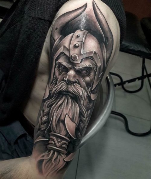 Viking Face Tattoo On Shoulder